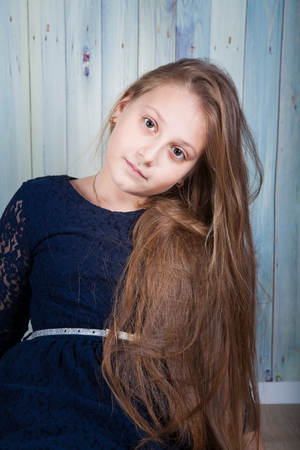 Portrait of a 10 year old girl, studio shot.の写真素材