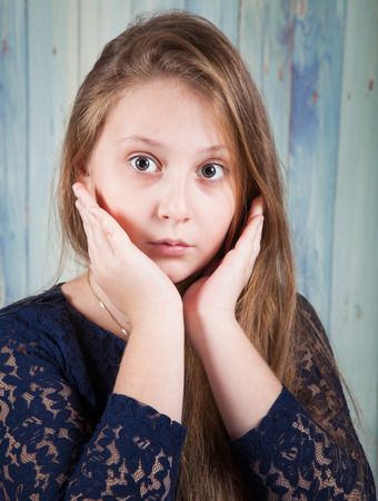 Portrait of a 10 year old girl, studio shot.の写真素材
