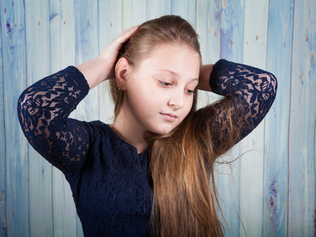 Portrait of a 10 year old girl, studio shot.の写真素材