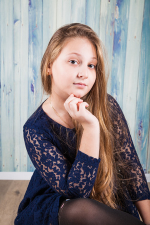Portrait of a 10 year old girl, studio shot.の写真素材