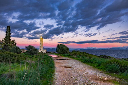 Sunset over Gytheio (Cranae) Lighthouse, during winter, in Laconia, Greece.の写真素材