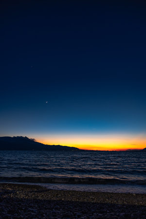 Sunset in winter over the Gulf Of Corinth, Greece.の写真素材