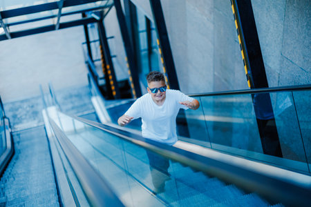 Urban portrait of a 10 year old boy in a city scenery.の写真素材