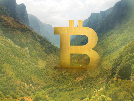 bitcoin sign in the valley, the giant crypto, Invincible coinの写真素材