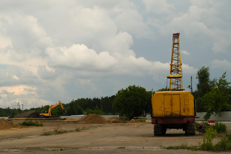 excavator digger machine working at construction site