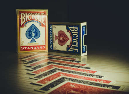 Russia, Saint-Petersburg, 12 June 2022: Two deck of Bicycle Playing Cards Standart on a white wooden background.のeditorial素材