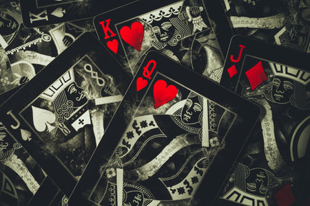 Concept of love triangle. Love triangle or being third wheel. Infidelity, having affair, or cheating concept. Background of poker cards. Russia, Saint-Petersburg, 21 June 2022.のeditorial素材