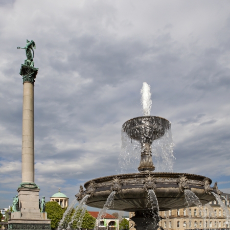 Fountain and Victory Column at Square Schlossplatz, Stuttgart, Germanyのeditorial素材