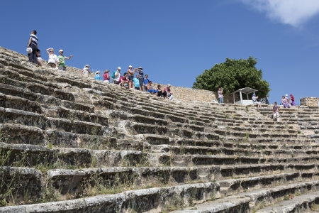 DENIZLI, TURKEY - May 21, 2013. Tourists visit amphitheatre of Hierapolis in Denizli, Turkey on 21 May 2013. Hierapolis was an ancient Greco-Roman city in Phrygia.のeditorial素材