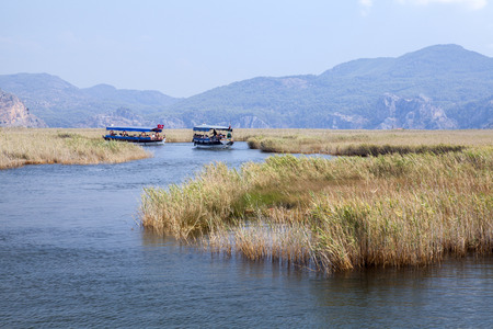 Boats on Dlayan river, Dalyan, Mugla, Turkeyの写真素材