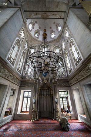 Istanbul, Turkey - May 24, 2013. He perform the ritual prayers of islam in Eyup Sultan Mosque on May 24, 2013. Eyup Sultan Mosque is one of the most important lansmark of Istanbul, Turkey.のeditorial素材
