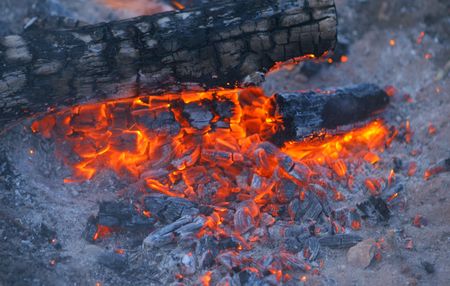 The Smouldering campfire and ash.の写真素材