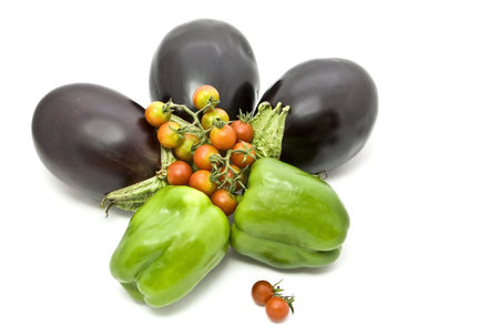 Eggplants, small tomatoes, Bulgarian pepper on a white background. の写真素材