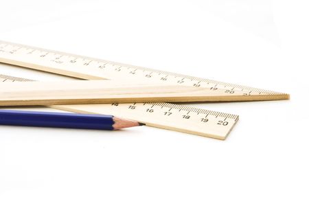 Pencil and ruler with a triangle on a white background. の写真素材