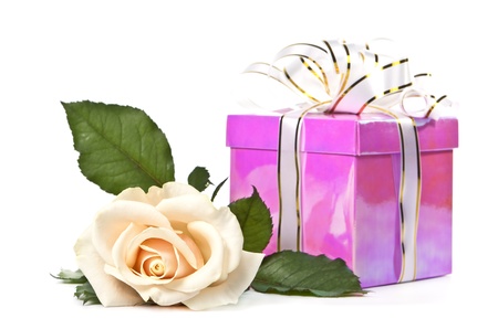 Beautiful light rose about the gift box with a white background.の写真素材