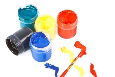 Several open jars with bright colors on a white background.の写真素材