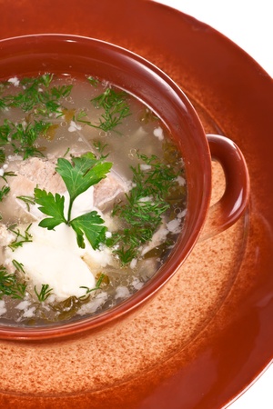 Soup from beef, pickled cucumbers and pearl barley, seasoned with sour cream and fresh greens の写真素材