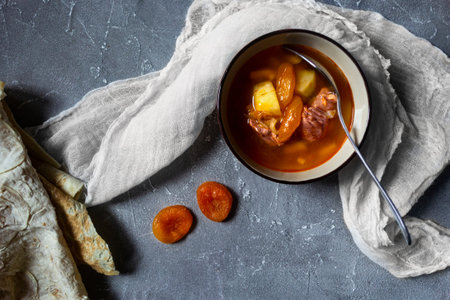 Armenian cuisine. Yajni - beef soup with dried apricot