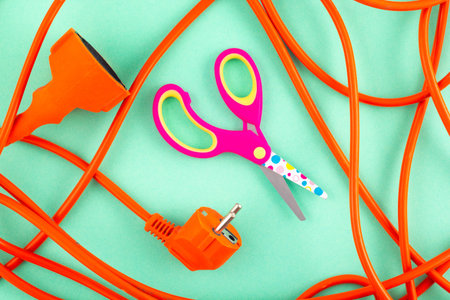 burnt electrical wire with baby scissors