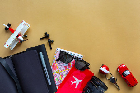 Mens travel accessories, devices, coffee on camel background. , Top view, flat lay and copy spaceの写真素材