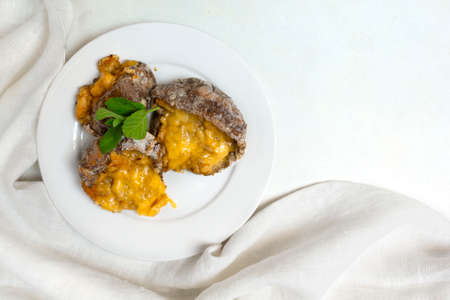 Stuffed Parasol Mushroom on white plate with copy spaceの写真素材