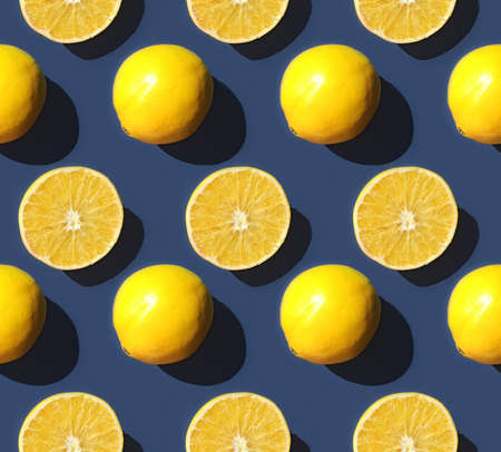 Seamless pattern with fruits oranges on the blue background.の写真素材