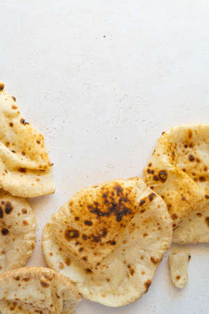 Flat lay of Freashly baked arab flatbreadsの写真素材