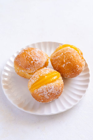 Berlin ball sweets on a white plate