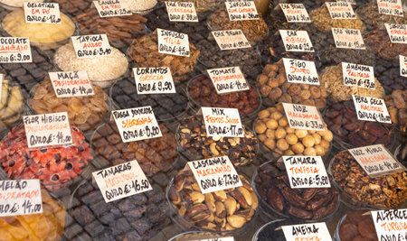 OPORTO, PORTUGAL - 28.07.2022: Showcase with Dried fruits and nuts- typical Portuguese productsのeditorial素材