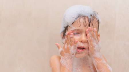 Toddler girl in bath with Soap Foam