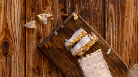 Top view of Almond turron dessert slices on wooden deskの写真素材