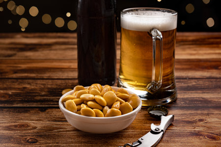 salted Lupin Beans with beer on bar tableの写真素材