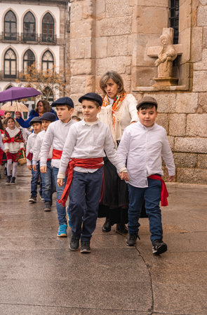 10 January 2023 - AMARANTE, PORTUGAL: kids in traditional clothes on festival Sao Gonsaloのeditorial素材