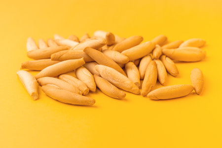 Heap of Spanish mini picos on yellowの写真素材