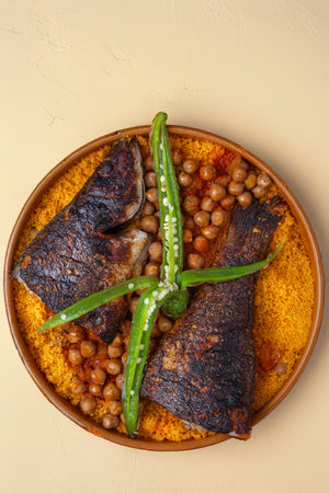 Top view of Tunisian couscous with fish
