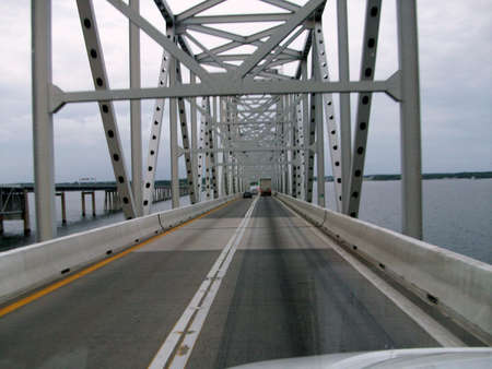 Metal girder bridge going to Virginiaの写真素材