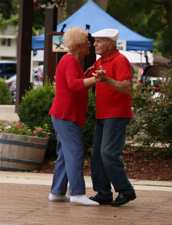 BUENA VISTA, NEW JERSEY USA  JULY 2, 2016 A senior couple dancing at a local event.のeditorial素材