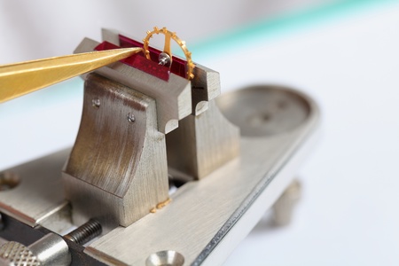 Detail from watchmakers workshop. Intentional shallow depth of field. の写真素材