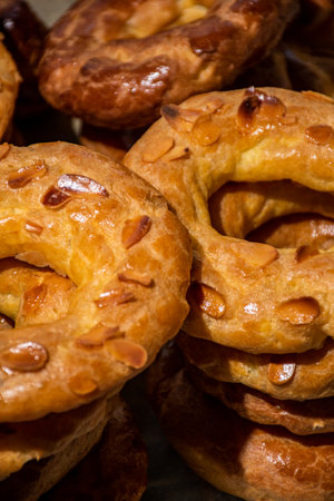 Almond donuts, homemade almond donuts. Homemade Spanish pastries with honey, butter and nuts.の写真素材