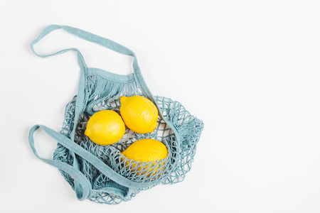 Cotton net bag with fruits. Sustainable lifestyle.  Eco friendly concept.の写真素材