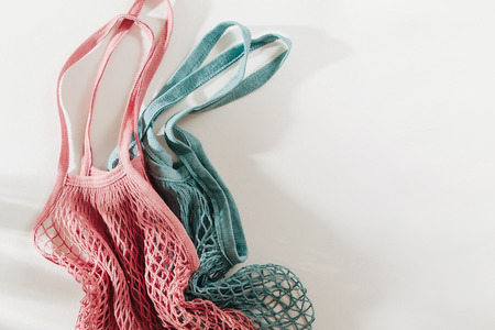 Reusable shopping bags on white background. Zero waste concept. No plastic.の写真素材