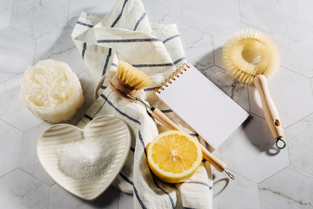 Natural cleaning products lemon, bamboo dish brushs with notebook. Eco friendly. Zero waste concept. Plastic free.の写真素材