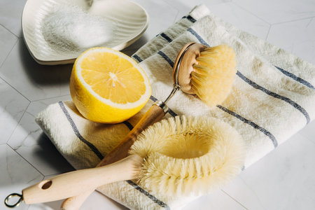 Natural cleaning products lemon and baking soda with bamboo dish brushs. Eco friendly. Zero waste...