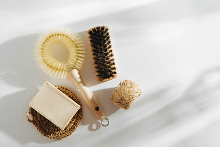 Natural dish brush and cleaning tools with Soap. Zero waste concept. Plastic free. Flat lay, top viewの写真素材