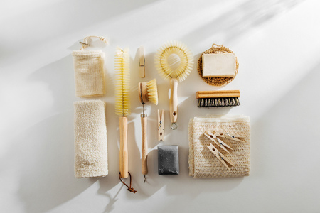 Natural dish brush and cleaning tools with Soap. Zero waste concept. Plastic free. Flat lay, top viewの写真素材