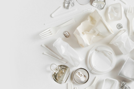 Food  plastic packaging  on  white background. Concept of Recycling plastic and ecology. Flat lay, top viewの写真素材