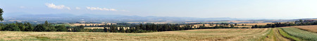 Panorama of a summer landscape with fields and villages.の写真素材