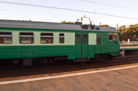 Commuter train waiting at stationの写真素材