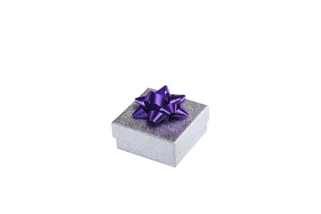 Gift box with a dark blue bow on a white backgroundの写真素材