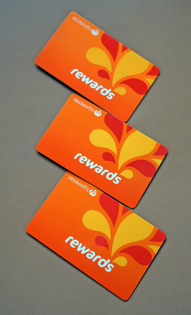Sydney, Australia - October 15, 2017: Three Woolworths Rewards loyalty cards. Woolworths Supermarkets is an Australian grocery store chain, along with Coles together accounting for about 80% of the Australian market.のeditorial素材
